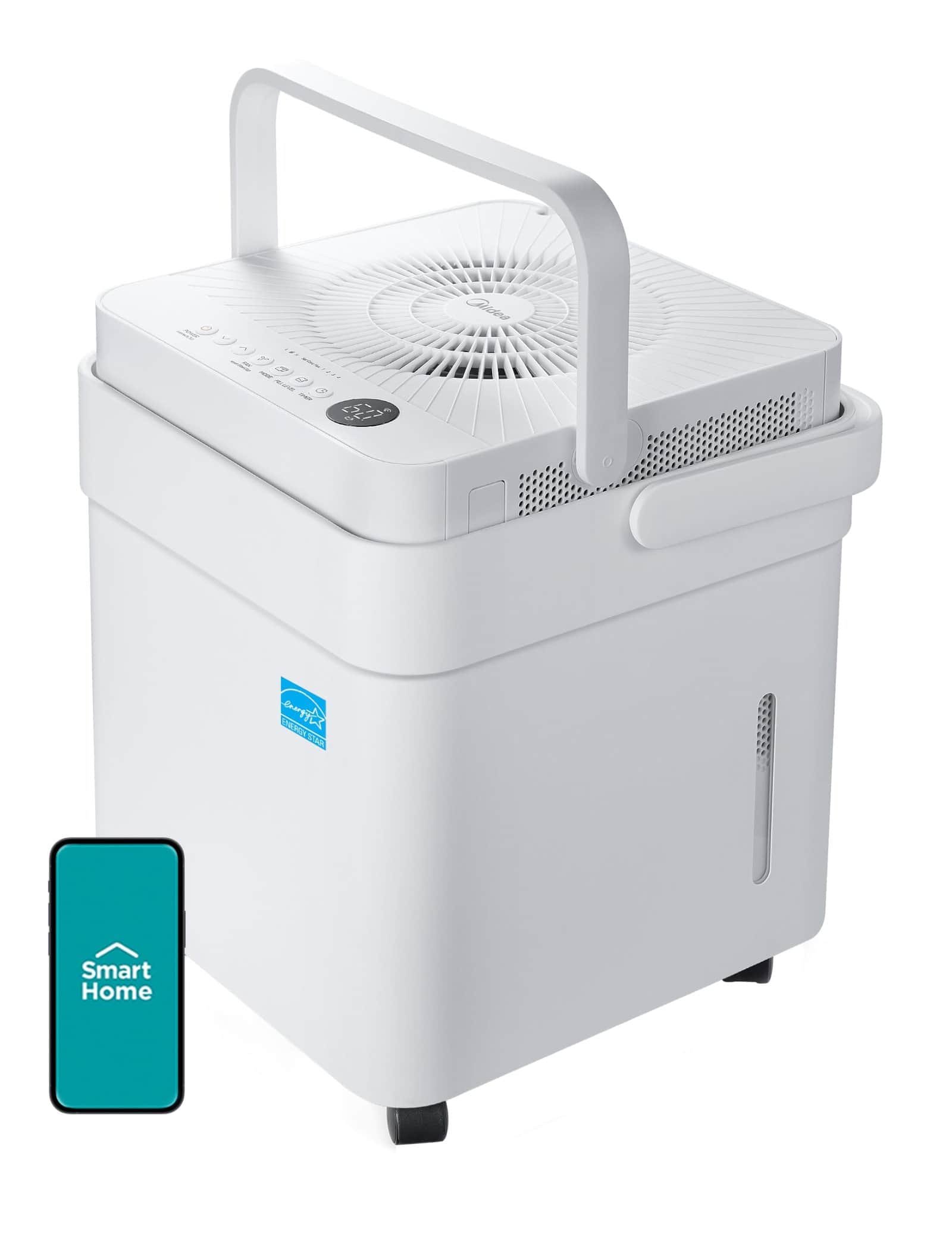 Midea 50-Pint Cube dehumidifier next to laundry area
