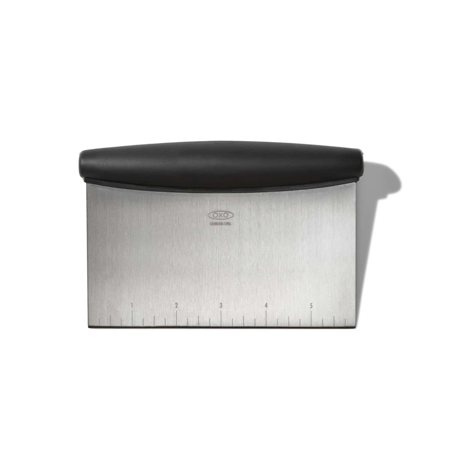 Close-up of scraper blade and ergonomic handle